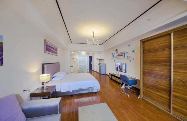 Imagen de la habitación del Hotel Atlantis International Holiday Apartment (luogang Wanda Square). Foto 7