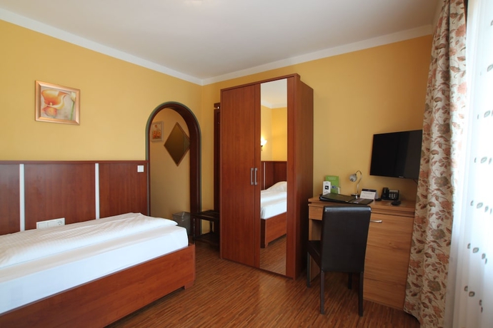 Imagen de la habitación del Hotel Atlas Grand, Garmisch - Partenkirchen. Foto 6