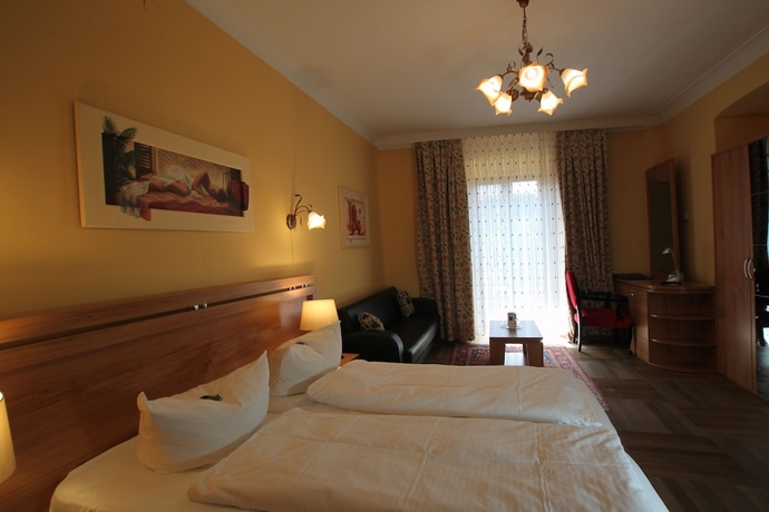 Imagen de la habitación del Hotel Atlas Grand, Garmisch - Partenkirchen. Foto 9