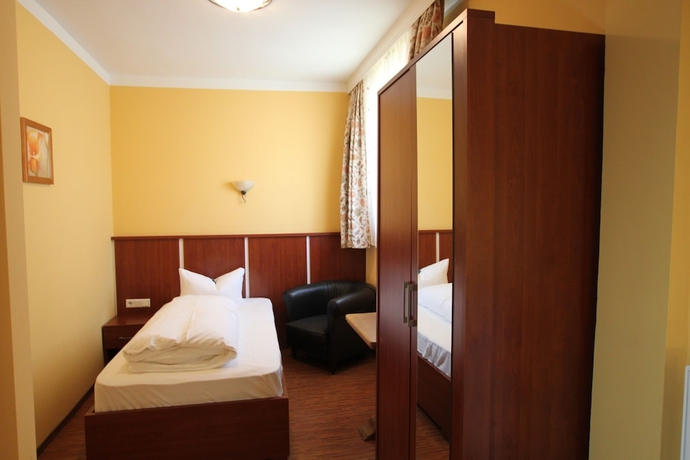 Imagen de la habitación del Hotel Atlas Grand, Garmisch - Partenkirchen. Foto 14