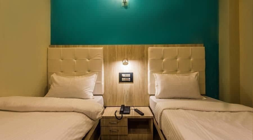 Imagen de la habitación del Hotel Atlas Grand, Mumbai. Foto 10