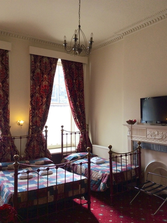 Imagen de la habitación del Hotel Atlas Guest House. Foto 2