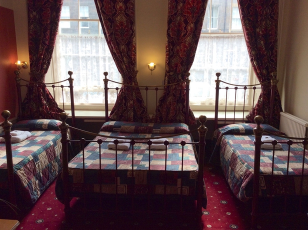 Imagen de la habitación del Hotel Atlas Guest House. Foto 6