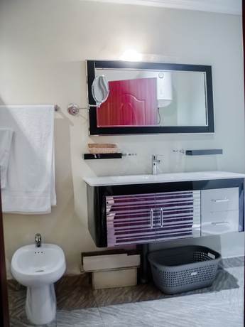 Imagen de la habitación del Hotel Atlas, Pointe-Noire. Foto 4