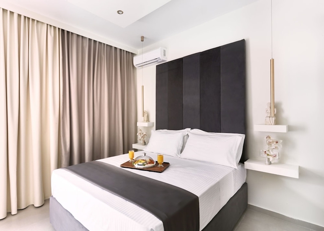 Imagen de la habitación del Hotel Atlas Suites. Foto 1