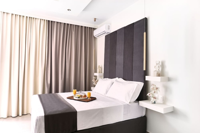 Imagen de la habitación del Hotel Atlas Suites. Foto 9
