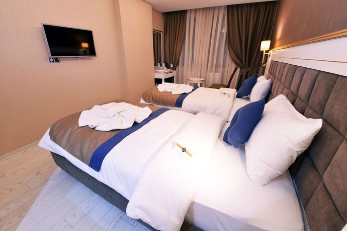 Imagen de la habitación del Hotel Atlihan Park. Foto 11