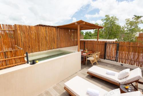 Imagen de la habitación del Hotel Atman Tulum. Foto 19