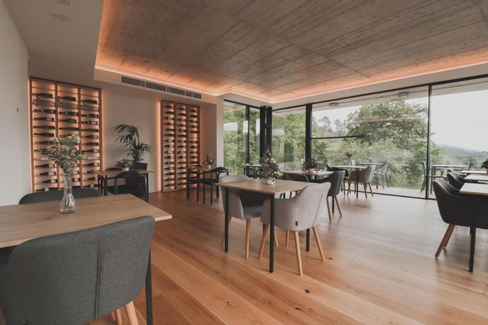 Imagen del bar/restaurante del Hotel Atmos Hotel Boutique. Foto 2