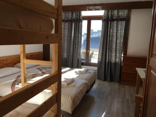 Imagen de la habitación del Hotel Atmosphere, Les Deux Alpes. Foto 6