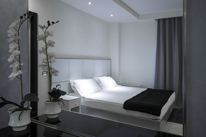 Imagen de la habitación del Hotel Atmosphere Suite. Foto 4