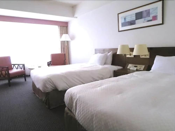 Imagen de la habitación del Hotel Atoll Emerald Miyakojima. Foto 8