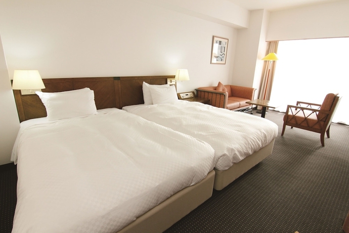 Imagen de la habitación del Hotel Atoll Emerald Miyakojima. Foto 11