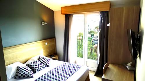 Imagen de la habitación del Hotel Atoll. Foto 16