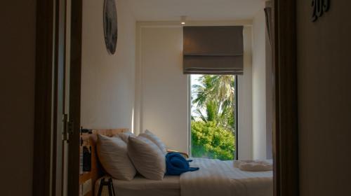 Imagen de la habitación del Hotel Atoll Retreat. Foto 18