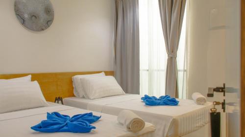 Imagen de la habitación del Hotel Atoll Retreat. Foto 19