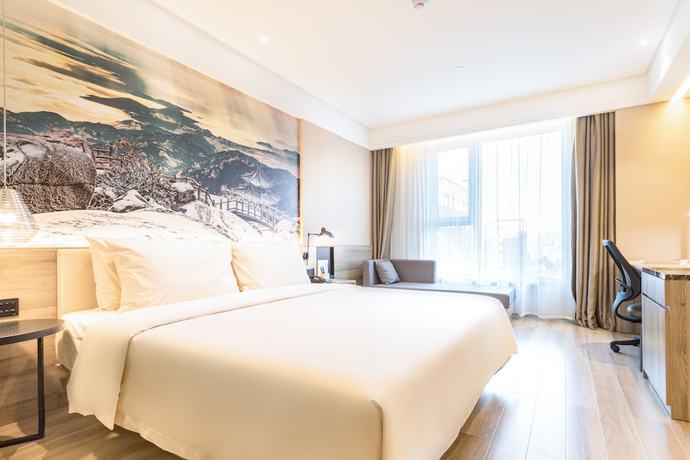 Imagen de la habitación del Hotel Atour Airport Century Park Qingdao. Foto 6