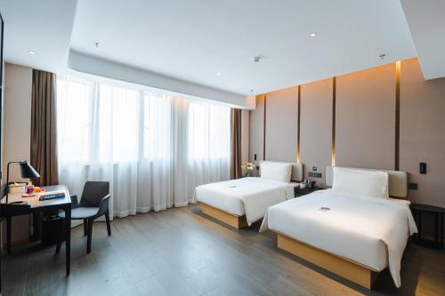 Imagen de la habitación del Hotel Atour Basketball Nanchang West Station. Foto 11