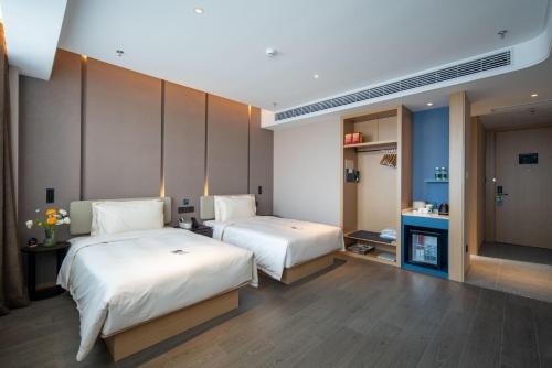 Imagen de la habitación del Hotel Atour Basketball Nanchang West Station. Foto 15