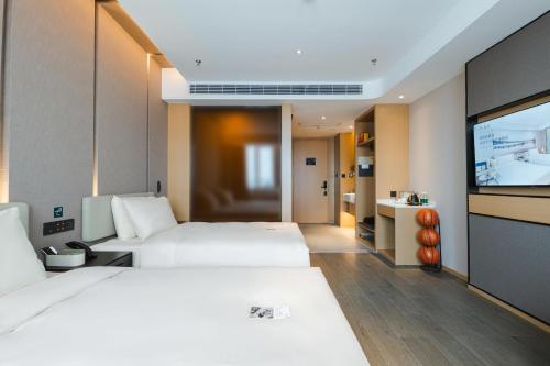 Imagen de la habitación del Hotel Atour Basketball Nanchang West Station. Foto 17