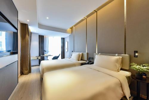 Imagen de la habitación del Hotel Atour Beijing Chaoyangmen. Foto 19