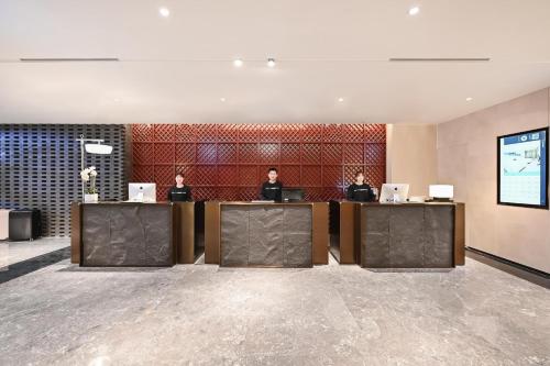 Imagen de los interiores del Hotel Atour Beijing Guomao Panjia Yuan. Foto 9
