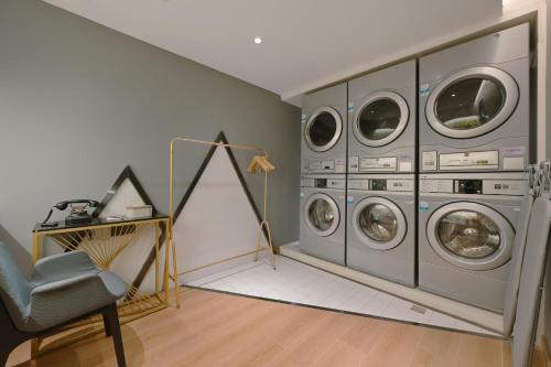 Imagen de los interiores del Hotel Atour Beijing Guomao Panjia Yuan. Foto 10