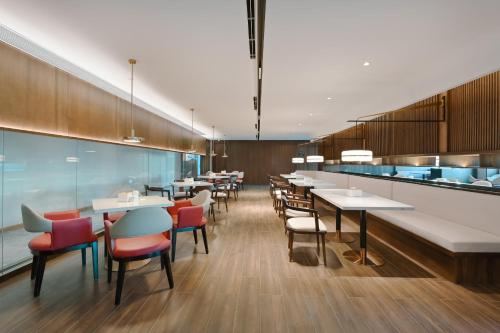Imagen de los interiores del Hotel Atour Beijing Guomao Panjia Yuan. Foto 11