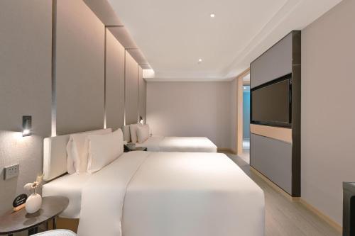 Imagen de la habitación del Hotel Atour Beijing Guomao Panjia Yuan. Foto 3