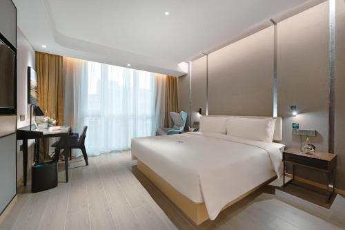Imagen de la habitación del Hotel Atour Beijing Guomao Panjia Yuan. Foto 4