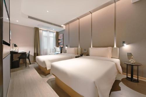 Imagen de la habitación del Hotel Atour Beijing Guomao Panjia Yuan. Foto 6