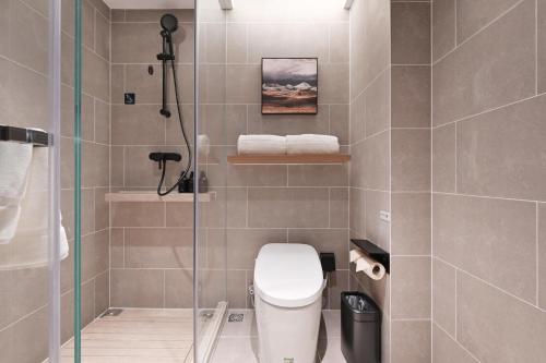 Imagen de la habitación del Hotel Atour Beijing Hepingli UIBE. Foto 9
