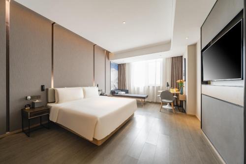 Imagen de la habitación del Hotel Atour Beijing Linkong New International Exhibition Center. Foto 9
