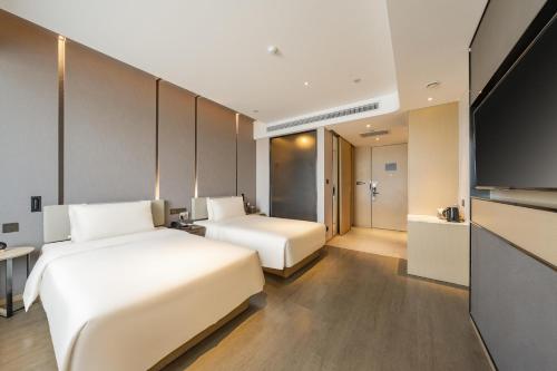 Imagen de la habitación del Hotel Atour Beijing Linkong New International Exhibition Center. Foto 11