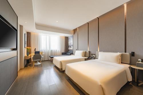 Imagen de la habitación del Hotel Atour Beijing Linkong New International Exhibition Center. Foto 12