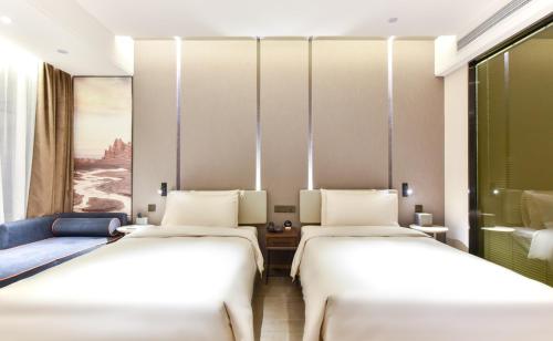 Imagen de la habitación del Hotel Atour Beijing Linkong New International Exhibition Center. Foto 14