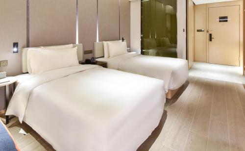 Imagen de la habitación del Hotel Atour Beijing Linkong New International Exhibition Center. Foto 16
