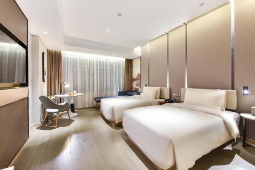 Imagen de la habitación del Hotel Atour Beijing Linkong New International Exhibition Center. Foto 18