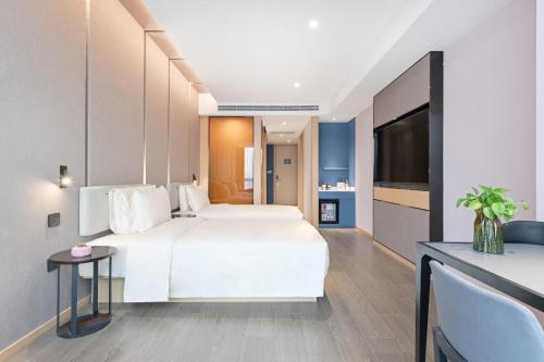 Imagen de la habitación del Hotel Atour Beijing North Chaoyang Road Changyingtian Street. Foto 16