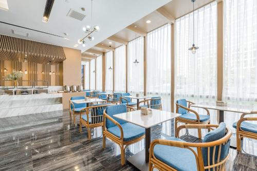 Imagen del bar/restaurante del Hotel Atour Beijing Yizhuang New Town Majuqiao. Foto 11