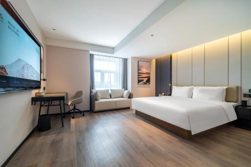 Imagen de la habitación del Hotel Atour Changchun Jingyuetan Park Jingyue Street. Foto 4
