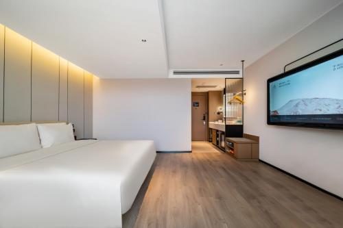 Imagen de la habitación del Hotel Atour Changchun Jingyuetan Park Jingyue Street. Foto 5