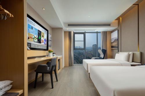 Imagen de la habitación del Hotel Atour Changhong Avenue. Foto 16
