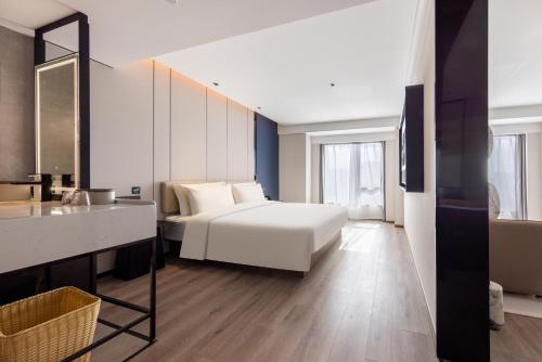Imagen de la habitación del Hotel Atour Changsha Wanjiali Middle Road Gaoqiao North. Foto 9