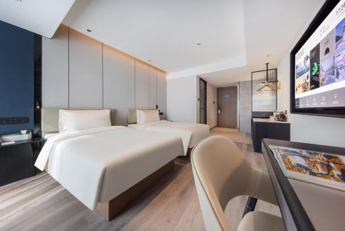 Imagen de la habitación del Hotel Atour Changsha Wanjiali Middle Road Gaoqiao North. Foto 16