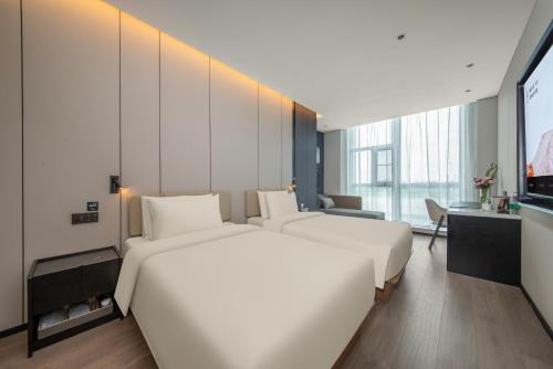 Imagen de la habitación del Hotel Atour Changshu Yunshang Town Mocheng Avenue. Foto 13