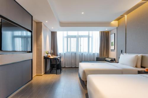Imagen de la habitación del Hotel Atour Changzhou Wujin Science and Education City. Foto 11