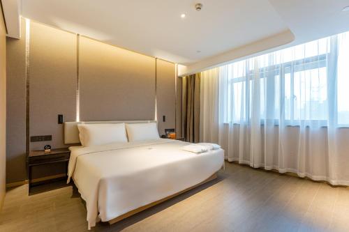 Imagen de la habitación del Hotel Atour Changzhou Wujin Science and Education City. Foto 16