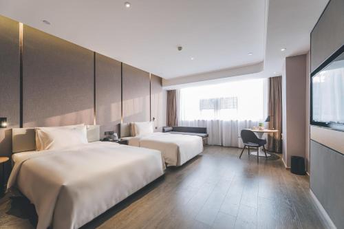 Imagen de la habitación del Hotel Atour Chaozhou Ancient Town People\'s Square. Foto 16