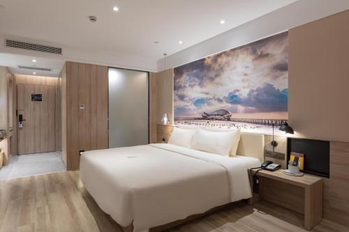 Imagen de la habitación del Hotel Atour Chaozhou Ancient Town People\'s Square. Foto 20